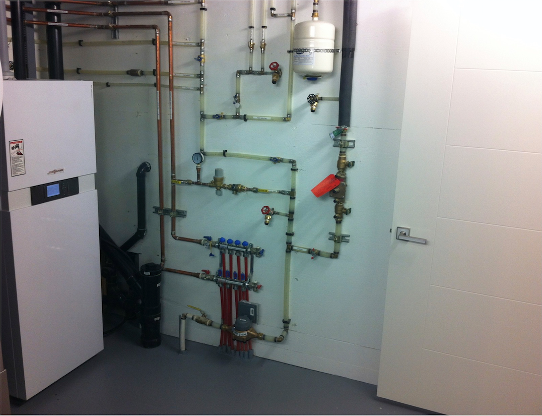 Mechanical room with Viessmann boiler and irrigation cross connection control device